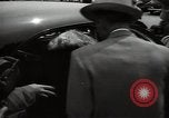 Standbild Mildred Gillars aka Axis Sally ankommen für Testversion Washington DC USA, 1948, aus Sekunde 28 historischem Filmmaterial Videoclip 65675032739
