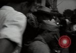 Standbild Mildred Gillars aka Axis Sally ankommen für Testversion Washington DC USA, 1948, aus Sekunde 45 historischem Filmmaterial Videoclip 65675032739