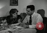 Standbild Familie auto worker Detroit Michigan USA, 1950, aus Sekunde 25 historischem Filmmaterial Videoclip 65675032774