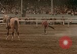 Standbild Rodeo United States USA, 1958, aus Sekunde 46 historischem Filmmaterial Videoclip 65675032784