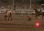 Standbild Rodeo United States USA, 1958, aus Sekunde 50 historischem Filmmaterial Videoclip 65675032784