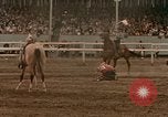 Standbild Rodeo United States USA, 1958, aus Sekunde 51 historischem Filmmaterial Videoclip 65675032784