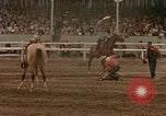 Standbild Rodeo United States USA, 1958, aus Sekunde 52 historischem Filmmaterial Videoclip 65675032784