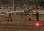 Standbild Rodeo United States USA, 1958, aus Sekunde 53 historischem Filmmaterial Videoclip 65675032784