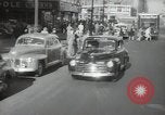 Image of New York City police car driving in midtown Manhattan New York City USA, 1939, second 3 stock footage video 65675032802