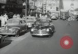 Image of New York City police car driving in midtown Manhattan New York City USA, 1939, second 6 stock footage video 65675032802
