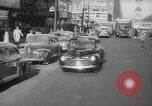 Image of New York City police car driving in midtown Manhattan New York City USA, 1939, second 7 stock footage video 65675032802