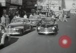 Image of New York City police car driving in midtown Manhattan New York City USA, 1939, second 9 stock footage video 65675032802