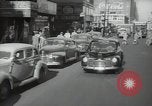 Image of New York City police car driving in midtown Manhattan New York City USA, 1939, second 10 stock footage video 65675032802