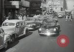 Image of New York City police car driving in midtown Manhattan New York City USA, 1939, second 11 stock footage video 65675032802