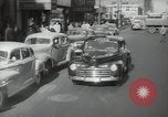 Image of New York City police car driving in midtown Manhattan New York City USA, 1939, second 13 stock footage video 65675032802