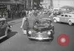 Image of New York City police car driving in midtown Manhattan New York City USA, 1939, second 15 stock footage video 65675032802