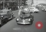 Image of New York City police car driving in midtown Manhattan New York City USA, 1939, second 16 stock footage video 65675032802