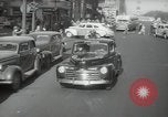 Image of New York City police car driving in midtown Manhattan New York City USA, 1939, second 17 stock footage video 65675032802