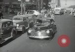 Image of New York City police car driving in midtown Manhattan New York City USA, 1939, second 18 stock footage video 65675032802