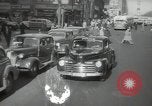 Image of New York City police car driving in midtown Manhattan New York City USA, 1939, second 19 stock footage video 65675032802