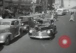 Image of New York City police car driving in midtown Manhattan New York City USA, 1939, second 20 stock footage video 65675032802