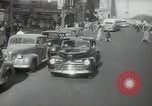 Image of New York City police car driving in midtown Manhattan New York City USA, 1939, second 21 stock footage video 65675032802