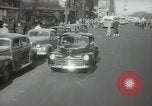 Image of New York City police car driving in midtown Manhattan New York City USA, 1939, second 22 stock footage video 65675032802