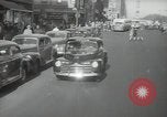 Image of New York City police car driving in midtown Manhattan New York City USA, 1939, second 23 stock footage video 65675032802