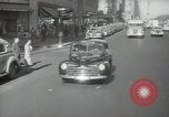 Image of New York City police car driving in midtown Manhattan New York City USA, 1939, second 26 stock footage video 65675032802