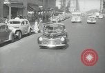 Image of New York City police car driving in midtown Manhattan New York City USA, 1939, second 28 stock footage video 65675032802