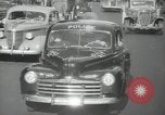 Image of New York City police car driving in midtown Manhattan New York City USA, 1939, second 53 stock footage video 65675032802