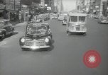 Image of New York City police car driving in midtown Manhattan New York City USA, 1939, second 55 stock footage video 65675032802