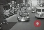 Image of New York City police car driving in midtown Manhattan New York City USA, 1939, second 57 stock footage video 65675032802