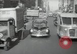 Image of New York City police car driving in midtown Manhattan New York City USA, 1939, second 59 stock footage video 65675032802