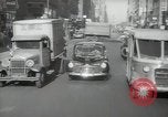 Image of New York City police car driving in midtown Manhattan New York City USA, 1939, second 60 stock footage video 65675032802