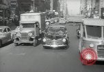Image of New York City police car driving in midtown Manhattan New York City USA, 1939, second 61 stock footage video 65675032802
