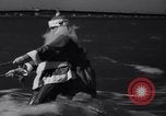 Image of Santa Claus on water skis Miami Florida USA, 1937, second 8 stock footage video 65675032891