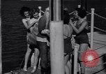 Image of Santa Claus on water skis Miami Florida USA, 1937, second 22 stock footage video 65675032891