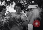 Image of Santa Claus on water skis Miami Florida USA, 1937, second 27 stock footage video 65675032891
