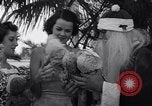 Image of Santa Claus on water skis Miami Florida USA, 1937, second 28 stock footage video 65675032891