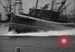 Image of cargo vessel Long Beach California USA, 1941, second 25 stock footage video 65675032898