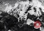 Image of burning books during the Hungarian Revolution Hungary, 1956, second 5 stock footage video 65675033230