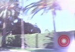 Immagine di Palm strada alberata nel quartiere Los Angeles California USA, 1976, secondo 40 filmato di repertorio 65675033263
