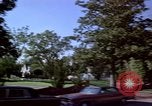 Immagine di Palm strada alberata nel quartiere Los Angeles California USA, 1976, secondo 45 filmato di repertorio 65675033263