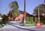 Immagine di Palm strada alberata nel quartiere Los Angeles California USA, 1976, secondo 60 filmato di repertorio 65675033263