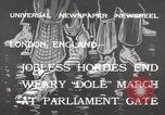 Image of British unemployed people march in protest United Kingdom, 1932, second 3 stock footage video 65675033280