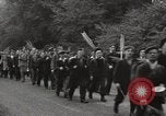 Image of British unemployed people march in protest United Kingdom, 1932, second 20 stock footage video 65675033280