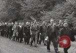 Image of British unemployed people march in protest United Kingdom, 1932, second 28 stock footage video 65675033280