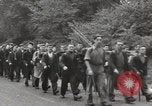 Image of British unemployed people march in protest United Kingdom, 1932, second 30 stock footage video 65675033280