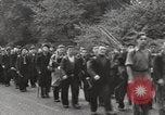 Image of British unemployed people march in protest United Kingdom, 1932, second 31 stock footage video 65675033280