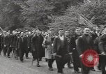 Image of British unemployed people march in protest United Kingdom, 1932, second 32 stock footage video 65675033280