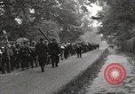 Image of British unemployed people march in protest United Kingdom, 1932, second 33 stock footage video 65675033280