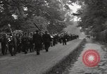Image of British unemployed people march in protest United Kingdom, 1932, second 34 stock footage video 65675033280