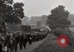 Image of British unemployed people march in protest United Kingdom, 1932, second 58 stock footage video 65675033280